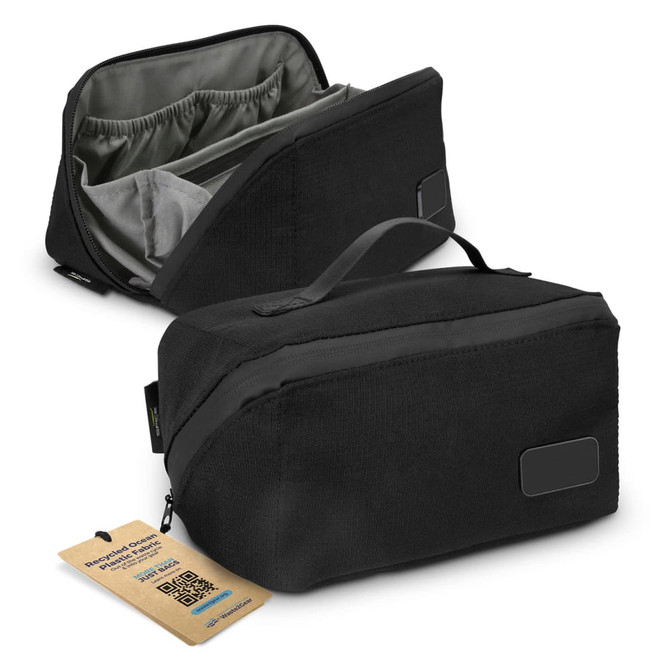 A black toiletry bag with a zippered opening and multiple compartments, featuring a tag and a subtle logo.