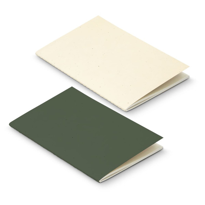 A green and cream soft cover notebook made from recycled paper, featuring a simple design and branding.