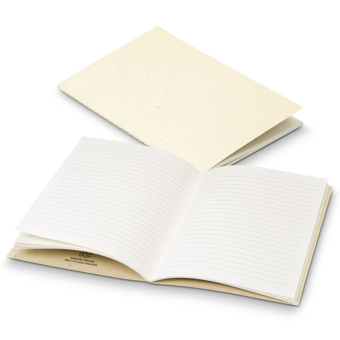 A soft cover notebook with a recycled paper exterior, featuring lined pages in shades of cream and beige.