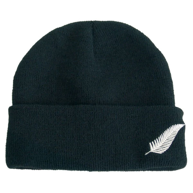 Acrylic beanie in dark green featuring a white silver fern design and a logo. Suitable for headwear collection.