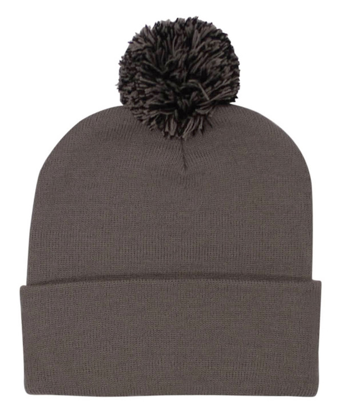 Acrylic beanie in grey with a large pom pom on top and a folded cuff at the bottom.