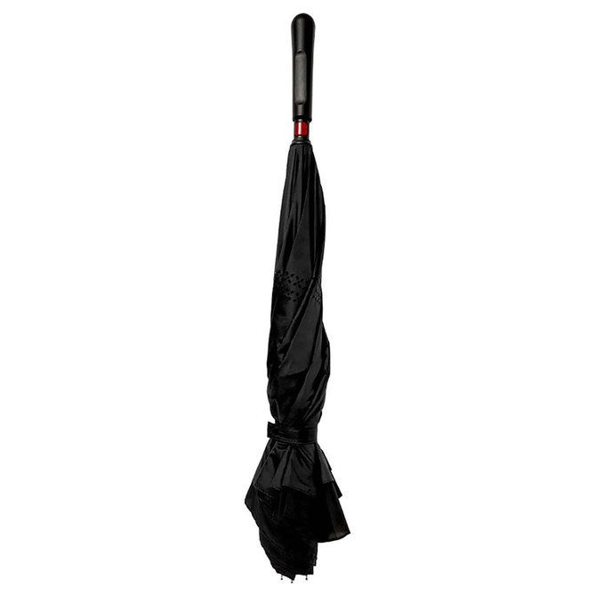 A black inverted umbrella featuring a sleek design and a handle with a slight curvature, secured with a strap.
