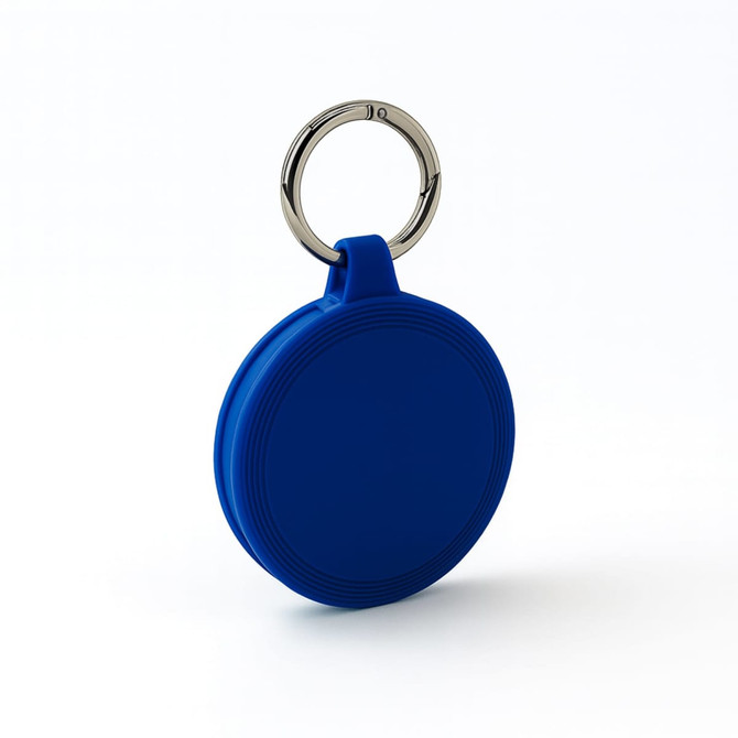 A blue keychain with a circular shape and a metal keyring attached.