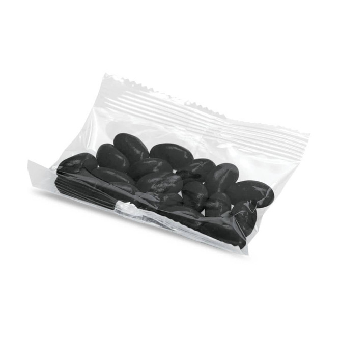 A transparent bag contains black jelly beans, showcasing their shiny surface and varied shapes.