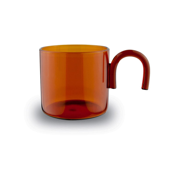 A transparent amber glass cup with a unique handle design, suitable for tea and coffee.