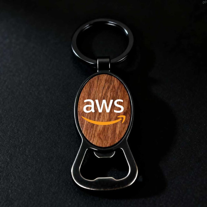 A drink bottle opener featuring a round wooden centre and a black metal frame, with a logo displayed on the wooden part.