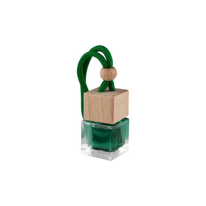 A green car reed diffuser in a clear glass bottle with a wooden cap and green string.