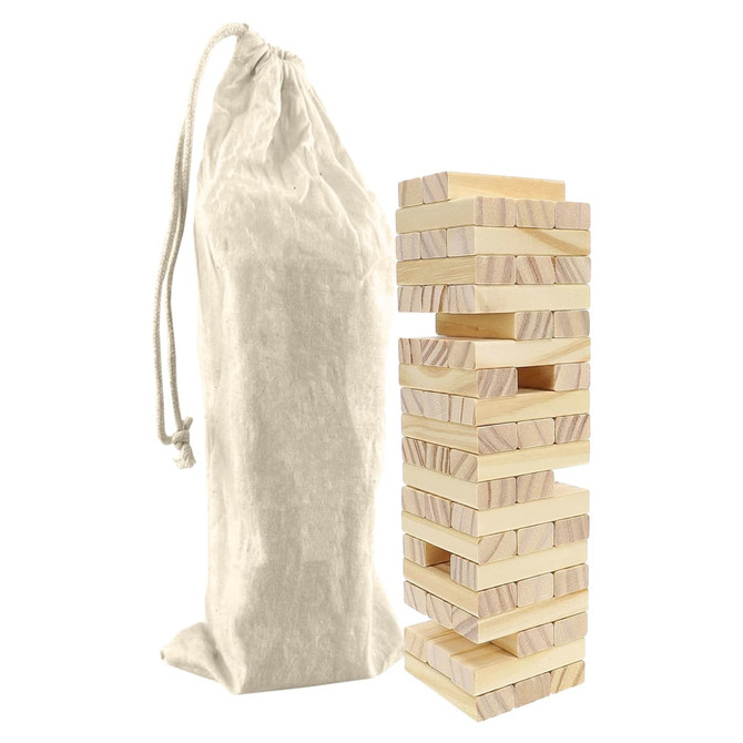 A Small Jenga set featuring wooden blocks stacked beside a cream drawstring bag.
