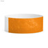 An orange Tyvek adult wristband with a textured finish and a white section. Features branding.