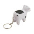 A stress keyring shaped like a black and white cow, attached to a silver chain.