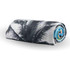 A rolled beach towel featuring a palm leaf design in black and grey, with a blue inner layer. It has a logo.