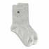 A pair of grey lounge socks with ribbed detailing and a logo on the side.