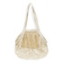 A small cotton mesh tote bag in cream colour with a spacious woven design and single shoulder strap.