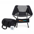 A portable camping chair in black fabric with a mesh backrest, accompanied by a carrying bag and a small speaker.