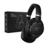 Black wireless headphones next to a black box featuring a logo, designed for noise cancelling with a sleek appearance.