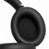 Aero by Nomis headphones feature a black, cushioned ear cup with a smooth leather finish. The product has a sleek design and branding.