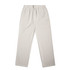 Faded cuffless track pants in a light beige colour, featuring an elastic waistband and side pockets.