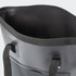 A black bucket bag with a wide opening and sturdy straps, featuring an interior without visible contents.