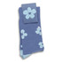 Knee-high socks in blue featuring a floral pattern and a matching tag with a flower design.