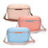 A set of three Daisy Coolers in pastel pink, peach, and light blue, each with a shoulder strap and a secure lid.