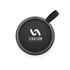 A round black speaker with a fabric loop and branding on the top.