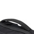 A black backpack with a sturdy handle, featuring textured fabric and a logo.