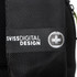A close-up of a black backpack featuring a textured surface and a branding label.