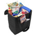 A black non-woven cooler bag filled with groceries, including drinks, condiments, and frozen items.