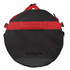 A round, medium-sized waterproof gear bag in black with red straps and a logo.