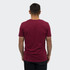 A maroon unisex T-shirt viewed from the back, featuring a simple design and a fitted silhouette.