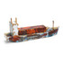 A wooden model of a rusted cargo ship in shades of brown and white, featuring a logo on the side.