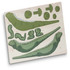 A wooden model kit featuring green pieces shaped like a tuatara, set on a wooden base with cut-out segments.