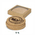 A set of four round cork coasters in a box, featuring a logo with a fish and script reading "RAMEN BAR".