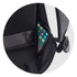 A black backpack with a side pocket containing a smartphone and padded straps for comfort. It has a logo.