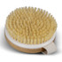 A wooden body brush with a round shape, featuring soft, light-coloured bristles and a cotton handle.