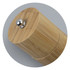 A bamboo pepper mill with a silver knob on the top, set against a grey circular background.