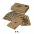 A set of kraft playing cards displayed alongside their brown cardboard box, featuring intricate designs and a logo.