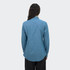 A denim button-up shirt in light blue, featuring a classic collar and long sleeves, with a logo on the back.