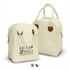A cream lunch bag with brown accents and a logo on the front, featuring two handles for easy carrying.