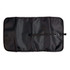 A black toiletry organiser bag with a large compartment and a fastening mechanism. It features a logo on the exterior.