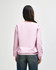 A pink Gildan Heavy Blend adult crewneck sweatshirt, viewed from the back, featuring long sleeves.
