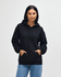 A black Gildan Heavy Blend adult hooded sweatshirt displayed on a model, featuring a front pocket and a relaxed fit.