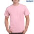 A pink heavy cotton adult T-shirt displayed on a model, featuring a logo on the upper right.