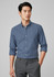 A button-up long sleeve shirt in blue, featuring a collar and rolled-up sleeves, paired with grey trousers.