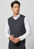 A dark grey men's vest with a v-neck design, paired with a white shirt. The vest features a logo on the side.