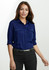 A navy blue long sleeve button-up shirt featuring two front pockets and rolled sleeves. It has a logo.