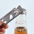 A stainless steel multi-tool is being used to open a bottle cap, with a drink bottle visible in the background.