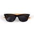 Bamboo sunglasses with a black frame and dark lenses, featuring a light bamboo accessory in the background.