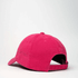 A pink cotton canvas unstructured 6-panel cap featuring an adjustable strap and a logo on the side.