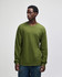 A long sleeve fine jersey T-shirt in olive green, featuring a crew neck and a logo. Styled with denim jeans.